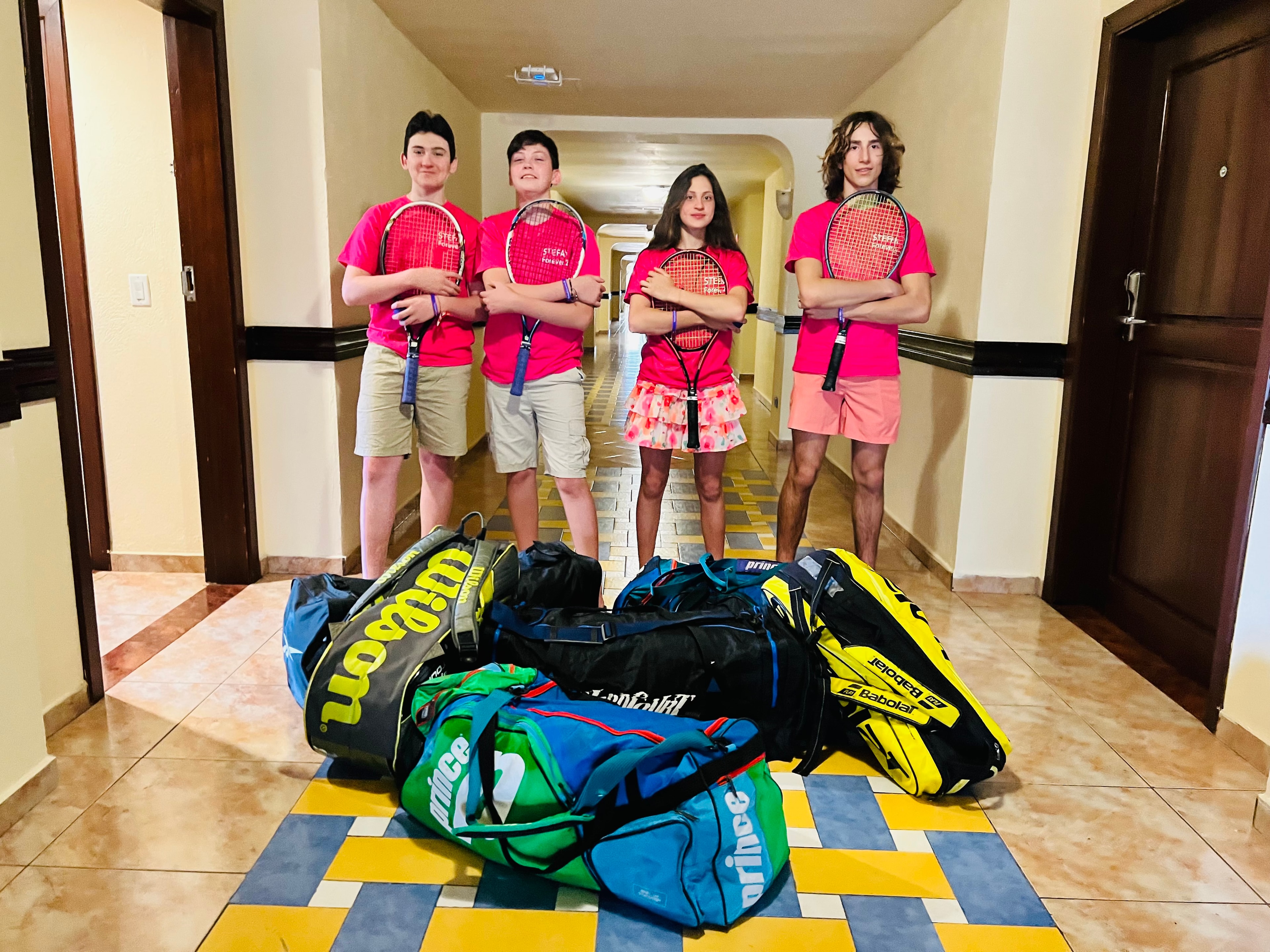 Foundation team with tennis gear ready to donate in Honduras