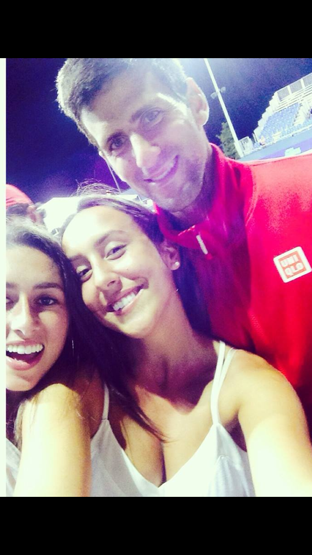Stefani with Novak Djokovic at a tennis event